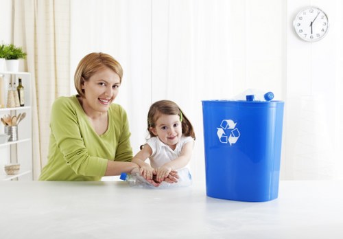 Business professionals discussing waste management solutions in Hanwell